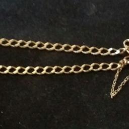 Length 7.5 inches. Weight 4.2 grams. Hallmarked. Has one key charm on it.