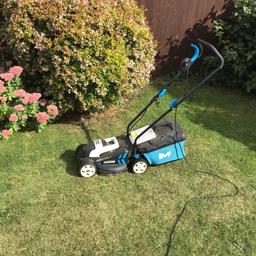 Lawn mower in great condition. Only one year old.