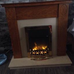 Gold electric fire and surround good condition working