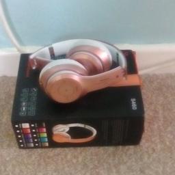 wireless stereo headphones rose gold.brand new never used.back on due to time wasters.