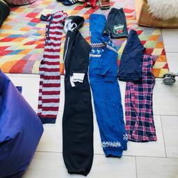 £2 each
thin stripe onesie age 11-12
navy fleecy onesie age 11-12
blue onesie age 9-10
check long PJs age 10-11 
blue PJ shorts age 9-10 * £1

buy all together or individually