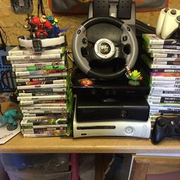 Xbox 360 bundle with 3 controllers docking station steering wheel and peddles 50 games all Disney infinity figures for game Kinect all leads white one sometimes draw stick other than that fully working order over £500 in games