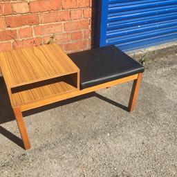 a 70's telephone table with leather seat in great condition.
Only £20
Dimensions are 80cm wide x 35cm deep x 46cm tall 
Collection from NN1 northampton or i can arrange delivery, message me for a quote.
Any questions please ask