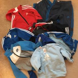 Bungle of boys Nike and Adidas clothes there is four pairs of trousers and five jackets and two jumpers used but in lovely condition size 18 to 24 months