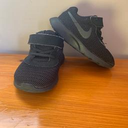 Black NIKE trainers in size 4.5. Not worn much and freshly washed, very good condition.
