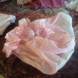 Baby's lovely pink Moses basket beeding and hood cover ,,the sheat goes over the handles ,nice filly sheat and hood cover