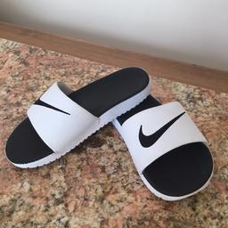 Nike White & Black Sliders
Size 13.5
Immaculate condition