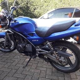 Kawasaki Er5 12 months mot, currently sorn.
Log book in my name.
Almost new tyres, chain and sprocket and battery. New Delkevic stainless exhaust system. Engine just serviced
Low miles but bodywork is tatty, tank has scratches and a couple of small dents, plastics are scratched. 
Ideal starter bike.