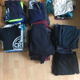 7 pairs of jeans 
1 Adidas trackie bottoms 
5 shirts 
6 jumpers. Hoodies 
14 t-shirts 
5 long sleeve tops 
1 autumn coat 

Still sorting will add more to it as we find it. 
All sorts of brand. Gap river island  burtons  O’Neil  top man  animal.  F&F 
All worn. Could do with a freshen up 
Smoke free house. But we do have dogs. 

Collect Brigstock village or I can deliver locally for small fuel cost 

£25 Ono