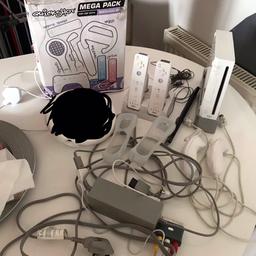 Nintendo Wii bundle

Comes with
Console
Power plug, scart lead
Motion detector
X2 white hand controls and base charger
X2 nunchuks (1 is slightly faulty)
Remote adapter
Mega pack, in original box