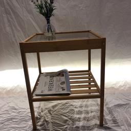 Cube bamboo side table with glass top shelf and slated lower shelf. Excellent condition. No marks at all. As good as new.