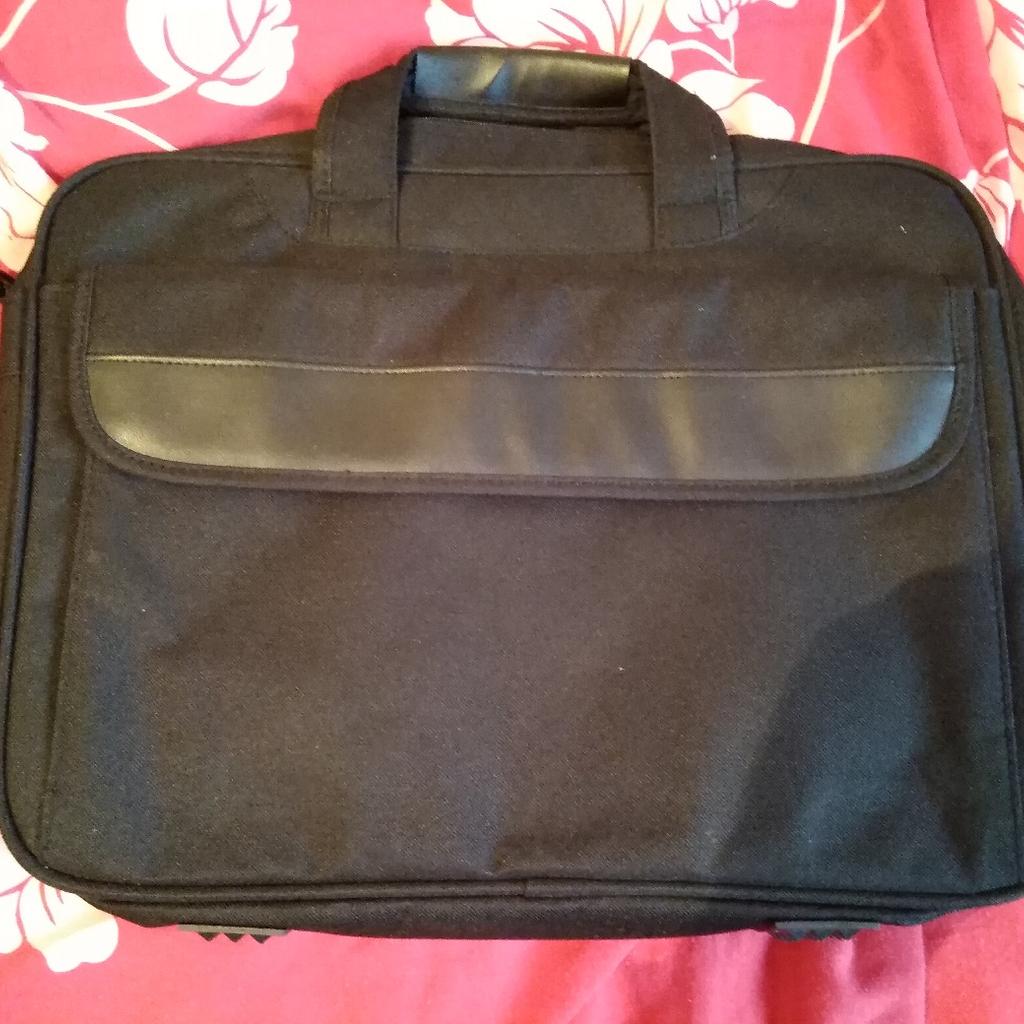 Black Laptop Bag

It has been used once or twice but is in good condition.

It has 4 compartments inside. 1 compartment on the front and back of bag.

If interested message me on 07878927313.