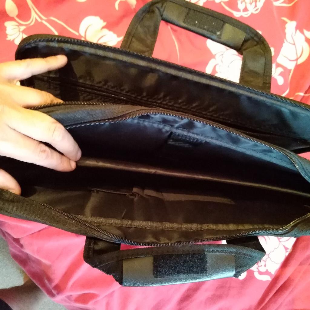Black Laptop Bag

It has been used once or twice but is in good condition.

It has 4 compartments inside. 1 compartment on the front and back of bag.

If interested message me on 07878927313.