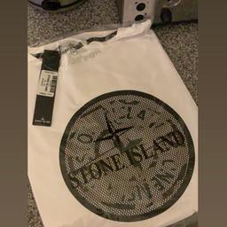 XL stone island t shirt. Can be worn as tight fit L or loose XL. 
Brand new with tag and packaging with original
Price on it.