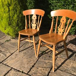 A lovely pair of pine fiddle back dining chairs with a dark pine varnish finish. 

Would look lovely painted in a Shabby Chic Style.

Can deliver within 30 miles for an additional fee.

We also have a set of 4 chairs on our listings, see our other listings