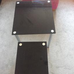 Set of black glass tables 
Excellent condition hardly ever used 
£20 ONO