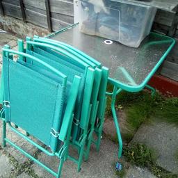 garden table and 4 chairs in good condition no umbrella collection only
