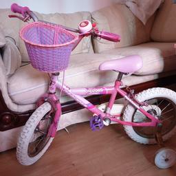 Children's bike with stabilizers,  bell and basket. 
Good condition.