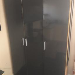 Bedroom furniture in blue triple wardrobe two bed side tables and chest of draws in as new condition must be collected by Saturday will dismantle wardrobe for transit
