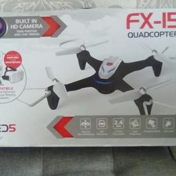 FX -15 quadcopter built in hd camera.take photos and live videos.compatable with smartphones and virtual reality headsets.good condition smoke free home.
