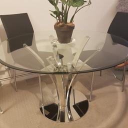 John Lewis round glass dining table and 4 leather chairs.
beautiful strong table. very fine scratches to the chrome base.
the glass is great except from a light scratche as seen on the last picture.
Dimensions 120cmx 120cm
Collection West Kensington w14