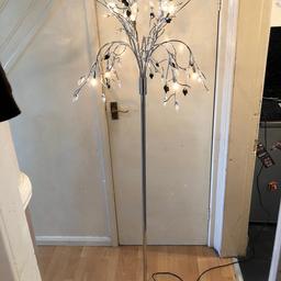 Selling our standing Silver Lamp with black leaves, some wear to the bottom which may come off, also has a dimmer on for different light, 
fully working, with spare bulbs, only selling as changed my colour scheme, cost a small fortune .
Pick up only south Liverpool.