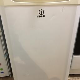 Under counter fridge with small freezer at the top. Fits quite abit of stuff in it. In okay condition just got afew marks from moving as shown in picture. Works perfectly fine.