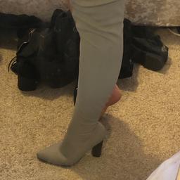 Thigh high boots size 5 worn once.