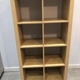 Two by four Ikea Expedit storage unit. Some minor damage at back and slight wear and tear. Lots of use left.