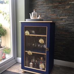 Beautiful bespoke blue and gold drinks cabinet complete with lift up lid, rack for glasses to hang and mirror. Can be personalised with lettering! Open to sensible offers.
