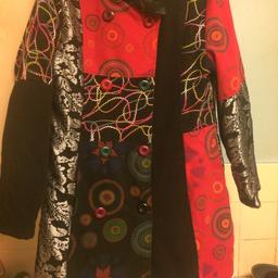Stunning 3/4 length lined coat in patchwork design. Only worn twice. Made in Italy. The size is marked xxl but fits 14/16.