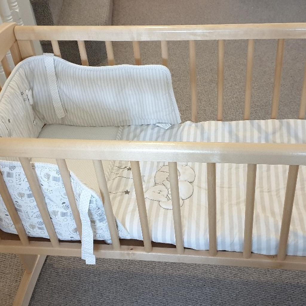 Swinging crib clearance bedding mothercare