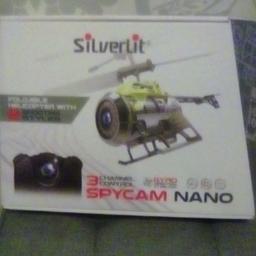 silverlit foldable helicopter with 2 shooting styles.3 channel control.good condition smoke free home.