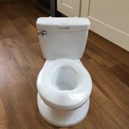 This looks like a real toilet, makes the noise of a flush when you pull handle down, little drawer on bag which is handy, hardly used like new. Was 25 pound new