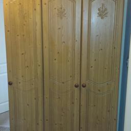 here I have up for sale this great 3 door solid wood wardrobe  great condition apart from scuff on the plinth (no drama ) h 76.5" w 48" d 21.5" it will come apart so can put small wardrobe at either side
will need two people on collection.