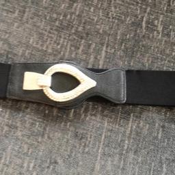 Black elasticated belt with diamanté fastener. 
Excellent condition