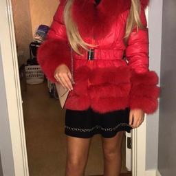 Selling red coat 
Excellent conditon worn twice 
Size small to medium 
Excellent quality 
Can be dress up or down 
Arms can come of to be worn as a gilet 
Tow for the price of one!
