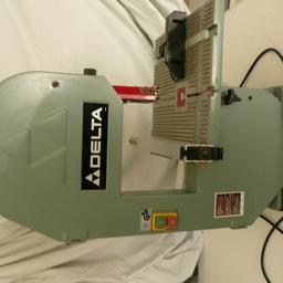 Delta Model 28-185 Bench Bandsaw. Single phase 230v 260 watt electric 8" model. Includes Original Instruction Manual in perfect condition.