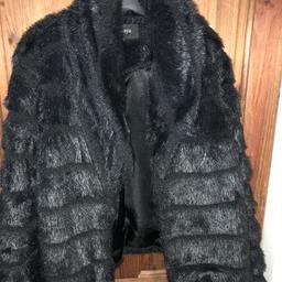 Black fur coat
Excellent condition 
Size 16
Smoke free home