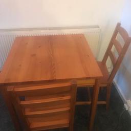 Wooden table and 2 chairs. Need it gone as hasn't got the room.