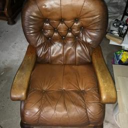 One chair is still in a good condition, the other one has split leather on a seat cushion and the buttons missing.
Would make a great project for someone!
