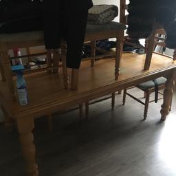 Solid wooden table had for about 10 years been passed through the family  2 chair cushions that come off just need to be screwed back on solid table pick up only for FREE need gone ASAP