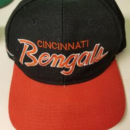 Black hat with orange bill and letters . Adjustable head strap. Clean and in excellent condition. 
Located in Pataskala (central), Ohio.  Buyer pays for shipping if needed.  Let me know if you need any additional info or pics.  (Cross posted.)