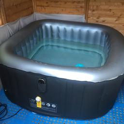 2+2 hot tub plus all chemicals, only used twice and kept undercover