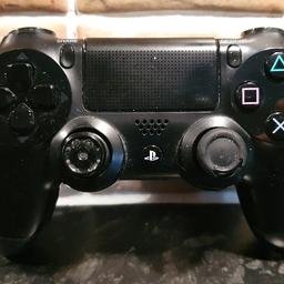 Black PS4 controller 
full working order 
some cosmetic damage ( see pictures )