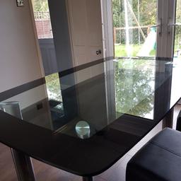 lovely black glass 6 seater table with chrome legs (no chairs)

width-100cm
length- 190cm

has a few scratches due to general wear and tear, has been well looked after.

from a smoke free home.