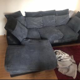 Grey and black corner sofa, can sit 3/4 people. Very comfortable. Comes in two parts, 4 seat cushions and 6 pillows. No scratched or damaged. Bought less than 2 years ago for £500. No delivery only collection. 214cm back length and 151cm for depth of the corner seating