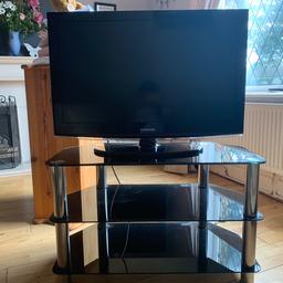 Black Samsung TV and glossy black TV stand. Fab condition, only selling to make room for redecorating. Will consider selling separately.