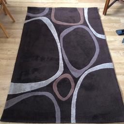 1.2 x 1.8m brown rug. about 15mm thick.

hardly used, very little wear. 
has been rolled up for a while