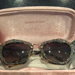 Used authentic Miu Miu sunglasses in a very good condition